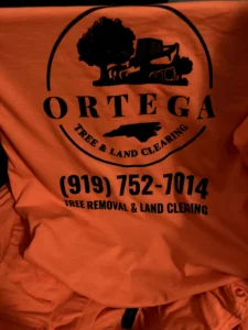 Custom high-visibility safety shirt for Ortega with bold screen printing.