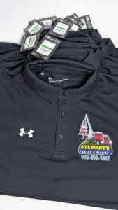 Custom Under Armour polos for Stewart’s Crane & Rigging.