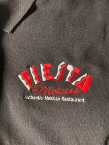 Embroidered polos for Fiesta Mexicana Restaurant by Inkterra Prints.